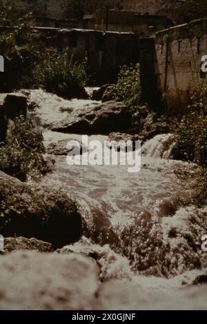 A small river flows through the city of Fez. [automated translation] Stock Photo