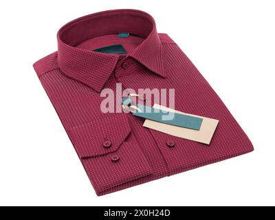 Red folded long sleeve shirt with a pattern in the shape of small white dots, isolated on a white background, template for designer Stock Photo