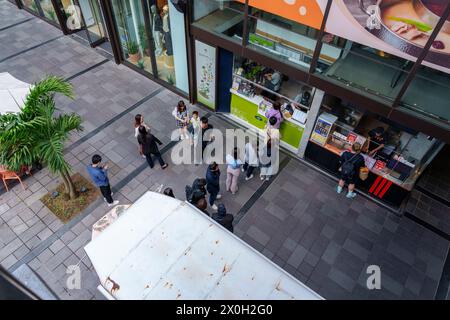 Taipei, Taiwan March 28 2024 People waiting in front of a tea shop in center Stock Photo
