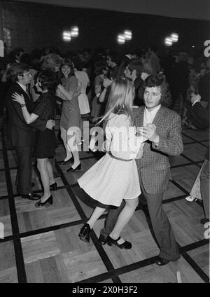 Young people dance standard dances at a prom after completing their basic course. [automated translation] Stock Photo