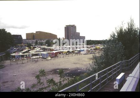 A crowd of people at the Polenmarkt on Potsdamer Platz, more precisely on the area from Reichpietsch Ufer to Potsdamer Platz, before it became a construction site after reunification. [automated translation] Stock Photo