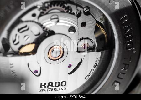 Lengnau, Switzerland - November 11, 2021: ETA movement of self-winding mechanic Swiss watch. Rado Automatic Open Heart 734.0510.3 Stock Photo