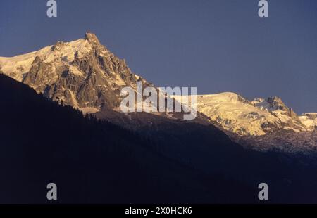 The Mont Blanc massif with the Aiguille du Midi seen in the evening sun from Chamonix. [automated translation] Stock Photo