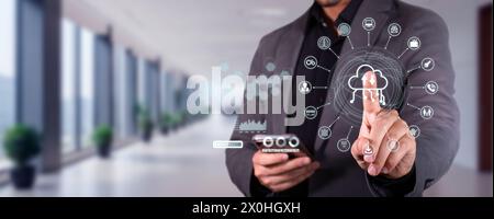 executive stores important information in the cloud, protecting your data. hologram with icons Stock Photo
