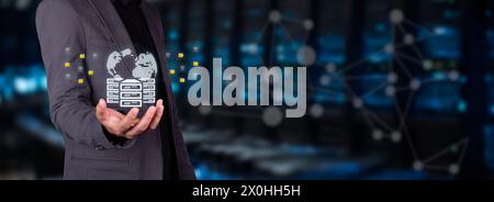 concept information in the cloud. businessman holds hologram of world servers with icons of folders and documents. Stock Photo