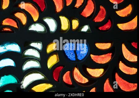Fragment of colorful stained glass decoration. Close up photo with soft selective focus Stock Photo