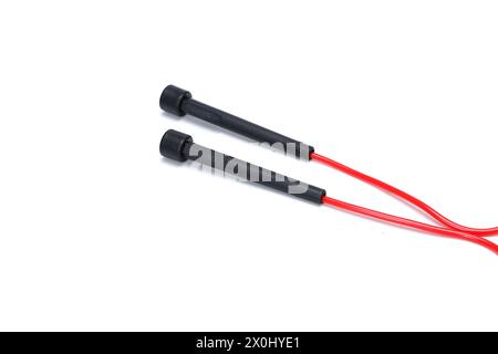 red black skipping rope isolated on white background Stock Photo