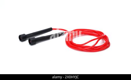 red black skipping rope isolated on white background Stock Photo