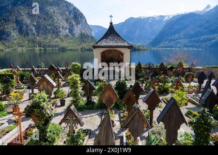 Hallstatt, Upper Austria, Austria. 12th Apr, 2024. Cemetery in the famous Austrian City of Hallstatt during the spring time. Hallstatt is a village on Lake Hallstatt's western shore in Austria's mountainous Salzkammergut region. Its 16th-century Alpine houses and alleyways are home to cafes and shops. The city is especially popular with Chinese tourists; so popular in fact, that China built a replica of the city, which opened in 2012. (Credit Image: © Andreas Stroh/ZUMA Press Wire/Alamy Live News) EDITORIAL USAGE ONLY! Not for Commercial USAGE! Stock Photo