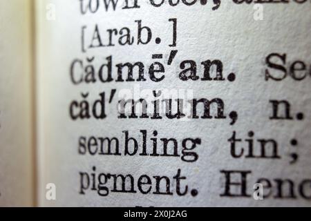 Word cadmium on dictionary page, macro close-up Stock Photo