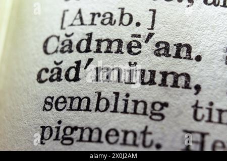 Word cadmium on dictionary page, macro close-up Stock Photo