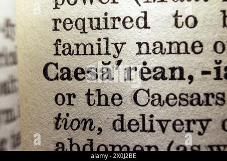 Word Caesarean on dictionary page, macro close-up Stock Photo