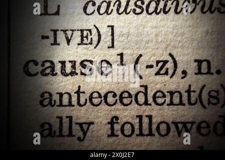 Word cause on dictionary page, macro close-up Stock Photo