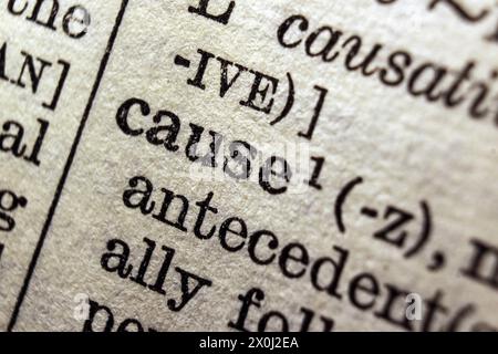 Word cause on dictionary page, macro close-up Stock Photo