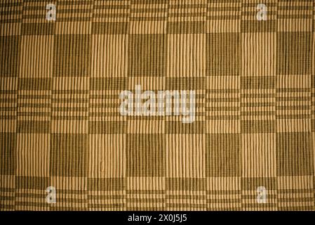 homespun yellow fabric with squares, texture Stock Photo