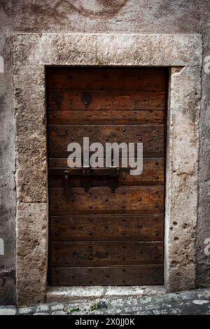 a beautiful medieval entrance door in solid wood Stock Photo