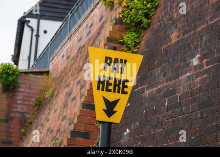 Public car park pay here sign, on street parking signpost Stock Photo