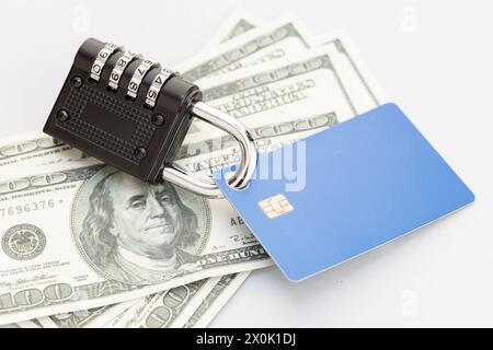 Security padlock closed on credit card. Credit card or financial security Stock Photo