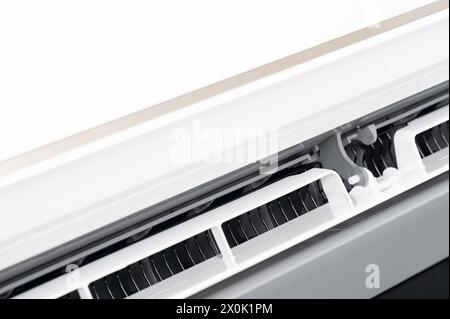 Plastic ventilation holes in air conditioner close up view Stock Photo