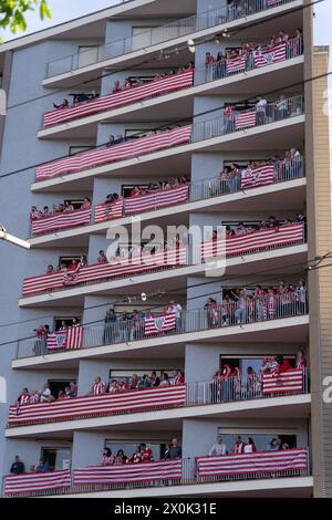 Bilbao, Biscay, Spain - April 11th 2024 - Athletic Club de Bilbao fans celebrate the 25th Copa del Rey title with the barge Stock Photo