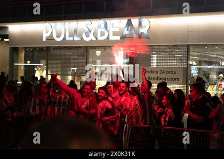 Bilbao, Biscay, Spain - April 11th 2024 - Athletic Club de Bilbao fans celebrate the 25th Copa del Rey title with the barge Stock Photo