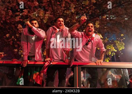 Bilbao, Biscay, Spain - April 11th 2024 - Athletic Club de Bilbao fans celebrate the 25th Copa del Rey title with the barge Stock Photo