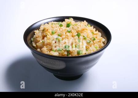 Japanese Garlic Fried Rice. Japanese food style in white background Stock Photo