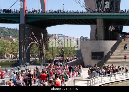 Bilbao, Biscay, Spain - April 11th 2024 - Athletic Club de Bilbao fans celebrate the 25th Copa del Rey title with the barge Stock Photo