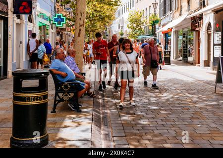 Main Street, Calle Real, is the main arterial street in the British overseas territory of Gibraltar, was established in the 14th century. Main Street Stock Photo