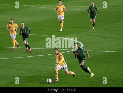 Leicester City's Kiernan Dewsbury-Hall and Plymouth Argyle's Morgan Whittaker (bottom right) in action during the Sky Bet Championship match at Home Park, Plymouth. Picture date: Friday April 12, 2024. Stock Photo