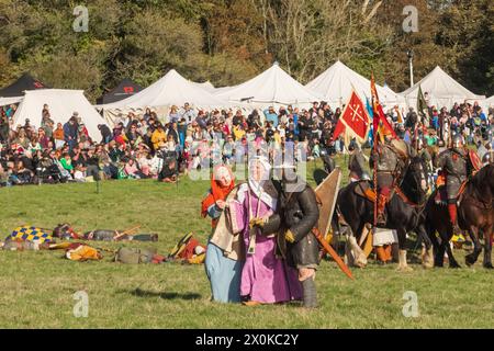 England, East Sussex, Battle, The Annual October Battle of Hastings Re-enactment Festival, Edith Swanneck aka Edith the Fair, Wife of King Harold being Escorted from The Field of Battle after the English Defeat Stock Photo