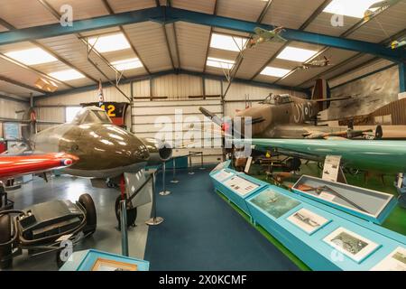 England, West Sussex, Chichester, Tangmere Military Aviation Museum, Display of Vintage Planes Stock Photo