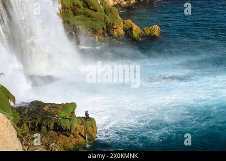 Angler at Düden Waterfall, Lara, Antalya, Antalya Province, Turkey, Asia Stock Photo