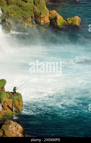 Angler at Düden Waterfall, Lara, Antalya, Antalya Province, Turkey, Asia Stock Photo