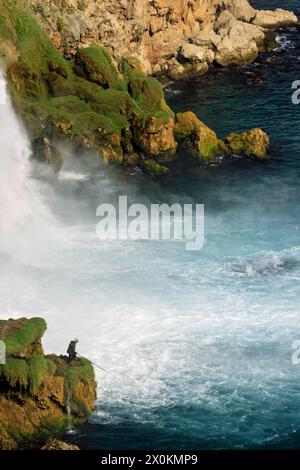 Angler at Düden Waterfall, Lara, Antalya, Antalya Province, Turkey, Asia Stock Photo