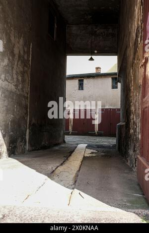 Courtyard entrance, old backyard with garages Stock Photo