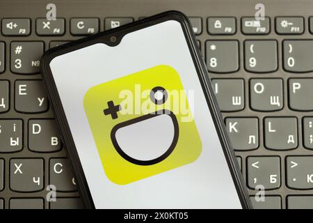 KYIV, UKRAINE - APRIL 1, 2024 Hago icon on smartphone screen on black keyboard close up. iPhone display with app logo on dark keypad buttons Stock Photo