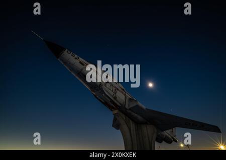 CF-101 Voodoo jetfighter gate guardian viewed during total solar eclipse totality from Miramichi, New Brunswick, Canada, on April 8, 2024. Stock Photo