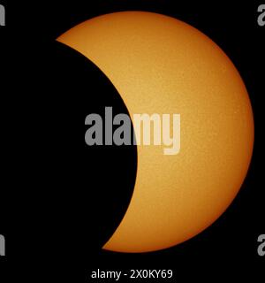 2024 Solar Eclipse Partial Phase in White Light with High Detail of the Photosphere and Sun Spots Stock Photo