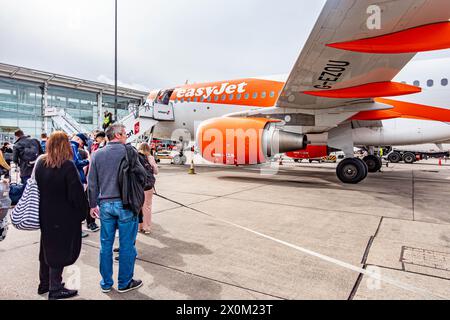 Passengers boarding an EasyJet aircraft at Birmingham International Airport Stock Photo