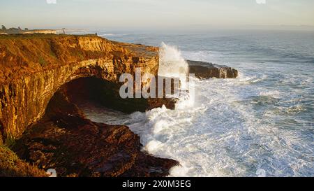 Waves and coastal cliffs in Wider Ranch State Park. Stock Photo