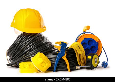 Rolled cables with electrician tools and electrical junction boxes on white background Stock Photo