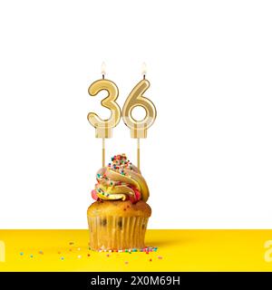 Birthday candle number 36 - Cupcake on white background Stock Photo