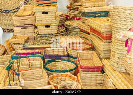 Totora crafts such as baskets, boxes, floor mats made from natural plant fiber, handmade by artisans from Imbabura province of Ecuador Stock Photo