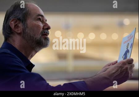 Mexico City, Mexico. 12th Apr, 2024. Juan Villoro is signing books at the National Center for the Arts in Mexico City, on the occasion of announcing his work ''Hotel Nirvana, '' which he wrote under the direction of Antonio Castro. (Photo by Gerardo Vieyra/NurPhoto)0 Credit: NurPhoto SRL/Alamy Live News Stock Photo