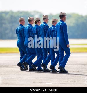 April 07, 2024: Officers of the U.S. Navy Flight Demonstration Squadron Blue Angels (L-R) #6 Commander Thomas Zimmerman, #5 Lieutenant Commander Griffin Stangel, #4 Lieutenant Commander Amanda Lee, #3 Lieutenant James Wesley Perkins, #2 Lieutenant Commander Jack Keilty and #1 Commander Alexander P. Armatas line up after exiting their Boeing F/A-18 Super Hornet aircraft at the end of the aerobatic demonstration at the Beyond The Horizon Air and Space Show at Maxwell Air Force Base in Montgomery, Alabama. Mike Wulf/CSM Stock Photo