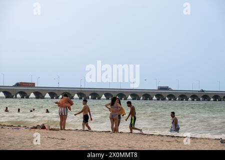 Progreso, Mexico. 22nd Mar, 2024. Tourists and locals enjoy a spring day at Progreso Beach, a more tranquil and laid-back atmosphere compared to the bustling resort city of Cancun. (Photo by Shawn Goldberg/SOPA Images/Sipa USA) Credit: Sipa USA/Ģ����ý Live News Stock Photo
