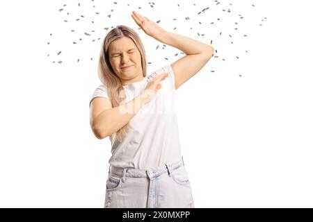 Swarm of bees attacking a young woman isolated on white background Stock Photo