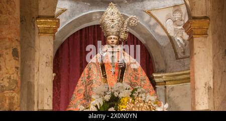 Pamplona, Spain - March 3rd, 2024: San Fermin Patron Saint figure at San Lorenzo Church, Pamplona, Navarra, Spain. Front view Stock Photo