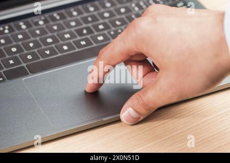 Cropped shot of unrecognizable people using a laptop Stock Photo